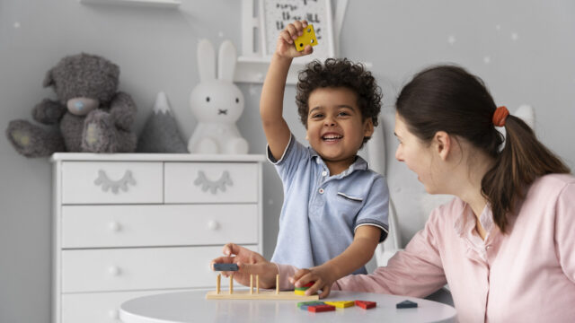 close-up-child-enjoying-didactic-game